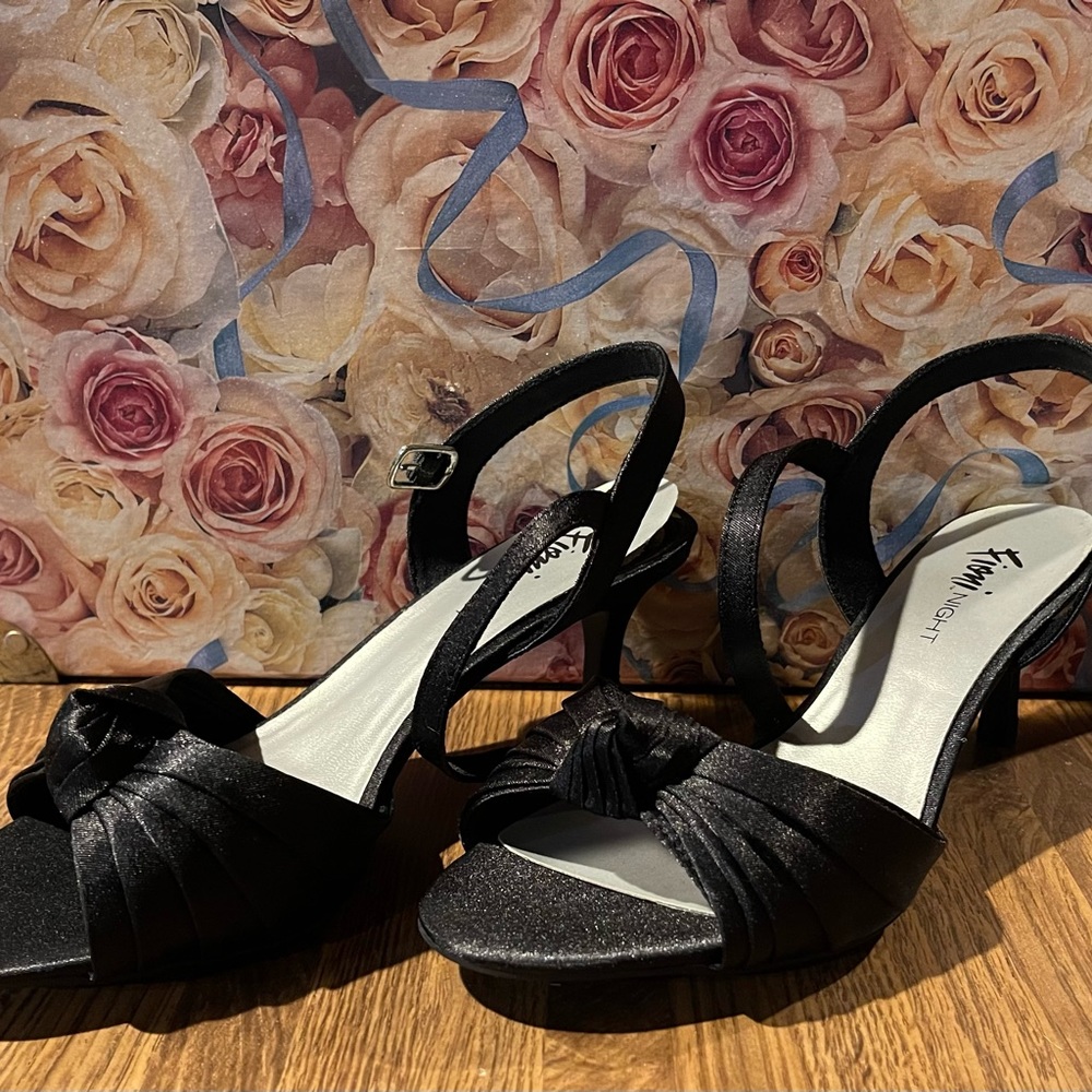 Black open toe ballroom dance heel.